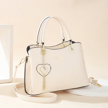 👜 LIMITED-TIME 50% OFF! ✨Elegant Heart Charm Tote Bag | Soft Faux Leather Crossbody with Adjustable Strap | Spacious Women's Shoulder Handbag💖